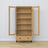 Display cabinet 1S oak natural oak with black – open doors, shelves and drawer inside