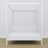 Double bed white with canopy – wooden frame corner, close-up