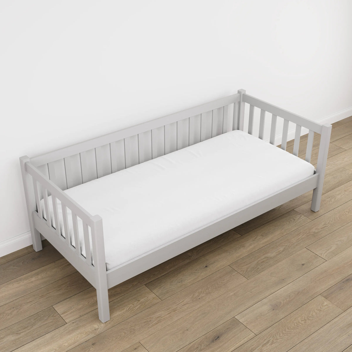 Letto divano grigio in nella cameretta dei bambini – allestimento scandi, in legno