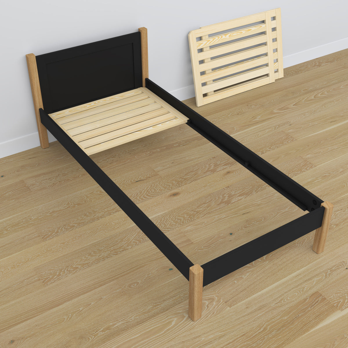 Single wooden bed black-oak – angled view, scandi children’s room