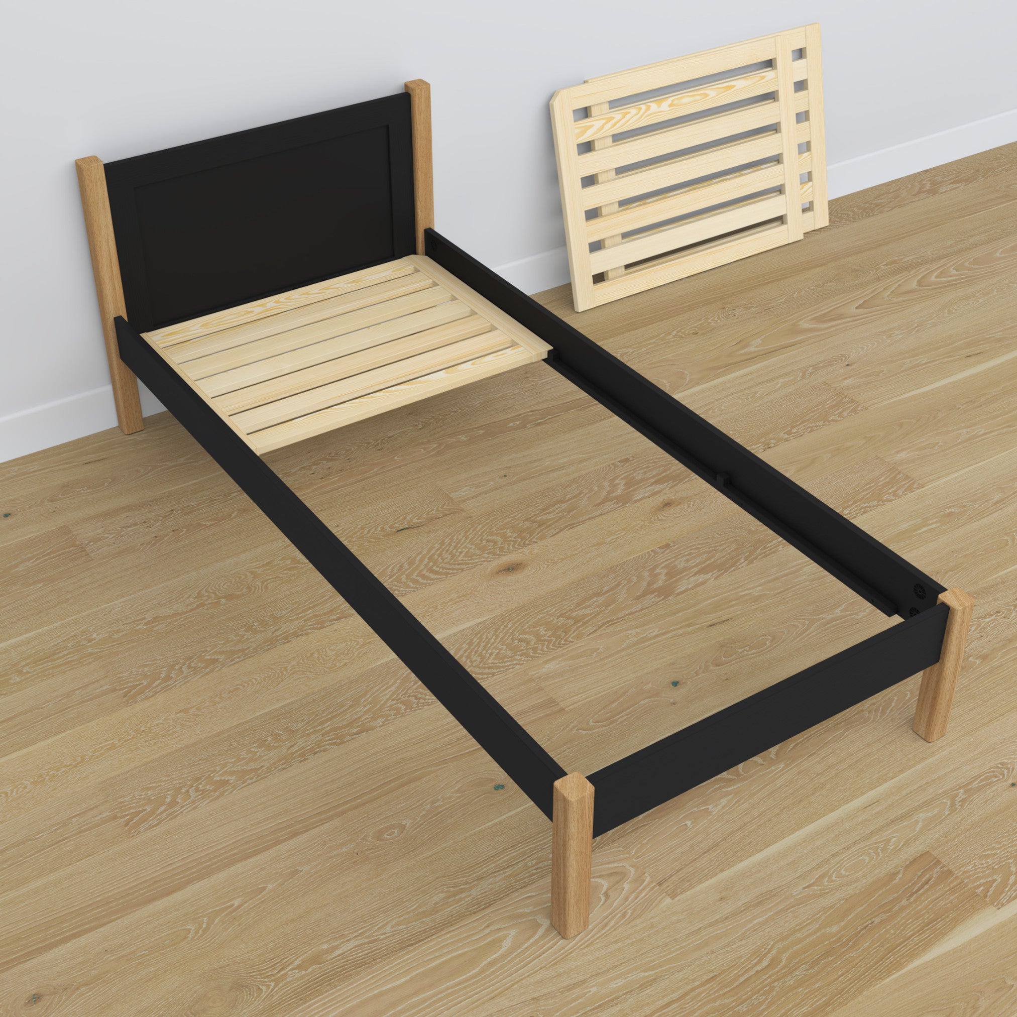 Single wooden bed black-oak – angled view, scandi children’s room