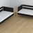Black and Oak Wooden Bunk Bed with Drawer – Scandi Children’s Room Arrangement