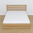 Letto matrimoniale con cassetto in rovere naturale – vista diagonale, camera da letto scandi
